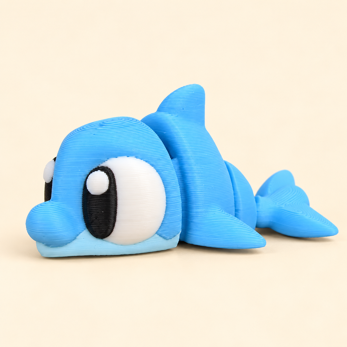 Flexi Dolphin — one included in this bundle; colours may vary